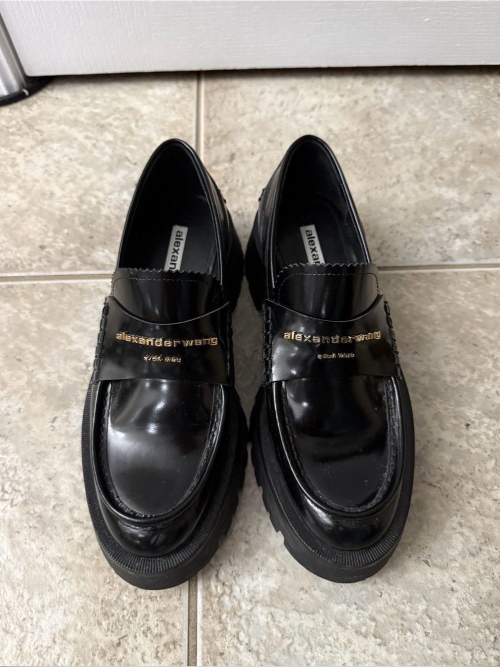 Alexander Wang Black Patent Leather Penny Loafers with Gold Logo